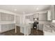 Open kitchen with granite countertops, stainless steel appliances, and a functional layout for cooking at 1949 Van Allen Ct # 4, Dacula, GA 30019