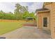 Spacious backyard with a gazebo, lush green lawn, and wooden fence at 321 Champions Dr, Fairburn, GA 30213