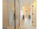 Modern bathroom features a tiled shower, double vanity, and tile floors at 321 Champions Dr, Fairburn, GA 30213