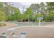 Community pool with a mushroom water feature, lounge chairs, and a shallow entry for  at 321 Champions Dr, Fairburn, GA 30213