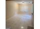 Spacious room featuring tile flooring, a large window, and natural light at 6050 Great Oaks Dr, Lithonia, GA 30058