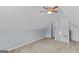 Spacious attic with a slanted ceiling, carpet flooring, and ample room for storage or potential conversion at 556 Walton Dr, Social Circle, GA 30025