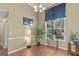 Bright dining room filled with natural light and featuring beautiful hardwood floors and neutral color scheme at 556 Walton Dr, Social Circle, GA 30025