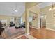 Inviting living room featuring a fireplace, high ceilings, and ample seating at 556 Walton Dr, Social Circle, GA 30025