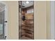 Stylish walk-in shower with tiled walls, a rain shower head, and sleek glass door at 556 Walton Dr, Social Circle, GA 30025