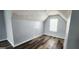 Cozy bedroom featuring a neutral wall color and wood floors at 1762 Wood Stork Drive, Hampton, GA 30228