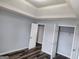 Bedroom featuring wood floors and a closet at 1762 Wood Stork Drive, Hampton, GA 30228