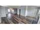 Large bonus room featuring wood floors, ample natural light, and neutral walls at 1762 Wood Stork Drive, Hampton, GA 30228