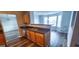 Eat-in kitchen with stainless steel sink and dark countertops at 1762 Wood Stork Drive, Hampton, GA 30228