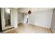 An empty living room features tile floors and an open floor plan at 1762 Wood Stork Drive, Hampton, GA 30228