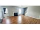Spacious living room featuring a fireplace and door to the outside at 1762 Wood Stork Drive, Hampton, GA 30228