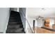 Carpeted staircase leading to upper level of the home at 1762 Wood Stork Drive, Hampton, GA 30228