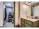 Bathroom with olive cabinets, and a room for laundry at 578 Mcgill Ne Pl # 578, Atlanta, GA 30312