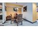 Dining area featuring a glass-top table, patterned chairs, and modern lighting at 578 Mcgill Ne Pl # 578, Atlanta, GA 30312