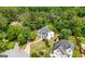 A beautiful two-story home with mature trees and landscaping in a quiet neighborhood at 9206 Denmeade Trce, Douglasville, GA 30135