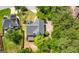 A two-story home with a deck and mature trees in a suburban neighborhood at 9206 Denmeade Trce, Douglasville, GA 30135