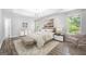 Stylishly furnished bedroom with a cozy area rug, offering a peaceful retreat at 9206 Denmeade Trce, Douglasville, GA 30135