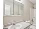 Bathroom with modern faucet, a framed mirror, and standard shower-tub combo at 4954 Browns Mill Rd, Lithonia, GA 30038
