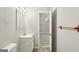 A bathroom with a toilet, sink, and vanity at 4954 Browns Mill Rd, Lithonia, GA 30038
