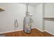 Image of a utility room featuring a hot water heater at 4954 Browns Mill Rd, Lithonia, GA 30038