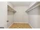 A walk-in closet with open shelving at 4954 Browns Mill Rd, Lithonia, GA 30038
