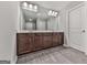 Spacious bathroom with double sink vanity, modern fixtures, and neutral decor at 1020 Broadview Dr, Marietta, GA 30062