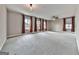 Large bonus room with plush carpeting, many windows, and neutral wall color at 1020 Broadview Dr, Marietta, GA 30062