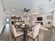 Open dining area with a modern table set, connected to the kitchen and living spaces at 1020 Broadview Dr, Marietta, GA 30062