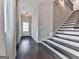 Inviting foyer with hardwood floors, a staircase, and a view of the front door at 1020 Broadview Dr, Marietta, GA 30062