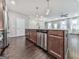 Open-concept kitchen featuring an island with stainless steel dishwasher and modern faucet at 1020 Broadview Dr, Marietta, GA 30062