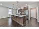 Modern kitchen with stainless steel appliances and a large island perfect for meal prep and gatherings at 1020 Broadview Dr, Marietta, GA 30062