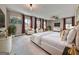 Bright main bedroom featuring large windows, a ceiling fan, and seating at 1020 Broadview Dr, Marietta, GA 30062