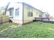 Rear exterior with walk out basement, deck, light colored siding and a fenced yard at 3035 Landington Way, Duluth, GA 30096