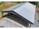 Wide angled aerial view of barn, highlighting the metal roof and open design at 457 Paynes Lake Rd, Carrollton, GA 30116