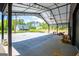 Barn interior with tractor and open view of the houses at 457 Paynes Lake Rd, Carrollton, GA 30116