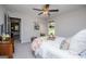 Lovely bedroom featuring a comfortable bed, with an antique chest that adds a touch of history at 457 Paynes Lake Rd, Carrollton, GA 30116
