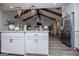 Open-concept kitchen with an island, stainless steel appliances, and seamless integration with the living area at 457 Paynes Lake Rd, Carrollton, GA 30116