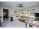 Inviting living room boasts a cozy seating area, stylish decor, and ample natural light streaming through large windows at 457 Paynes Lake Rd, Carrollton, GA 30116