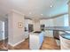 Spacious kitchen featuring white cabinets, stainless steel appliances, and granite countertops at 110 Vicarage Ct, Johns Creek, GA 30005