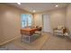 Bright office space with natural light from the window and neutral decor for a peaceful atmosphere at 110 Vicarage Ct, Johns Creek, GA 30005