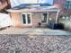 Brick patio with outdoor seating and grill. An air conditioning unit sits against the house at 120 Williamsburg Way, Fayetteville, GA 30214