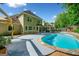 Spacious backyard with pool, patio and outdoor dining area at 3707 Lance Bluff Ln, Duluth, GA 30097
