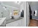Bathroom with soaking tub and shower combination and backyard view at 3707 Lance Bluff Ln, Duluth, GA 30097