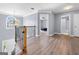 Second floor landing showcasing a view into the bedroom and bathroom at 3707 Lance Bluff Ln, Duluth, GA 30097
