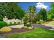 Peachtree Bluff community entrance sign surrounded by landscaped greenery at 3707 Lance Bluff Ln, Duluth, GA 30097