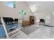 Vaulted sunroom with tile floor, wooden bench, and lots of natural light at 604 Clearwater Ct, Mcdonough, GA 30252