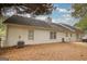 This home's backyard features a well-maintained lawn, a privacy fence, and ample space for outdoor entertaining at 70 Summer Walk Dr, Covington, GA 30016