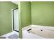 Bathroom featuring a shower and soaking tub at 70 Summer Walk Dr, Covington, GA 30016