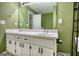 Bathroom featuring double sinks and a door at 70 Summer Walk Dr, Covington, GA 30016