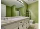 Bathroom featuring double sinks and vanities at 70 Summer Walk Dr, Covington, GA 30016